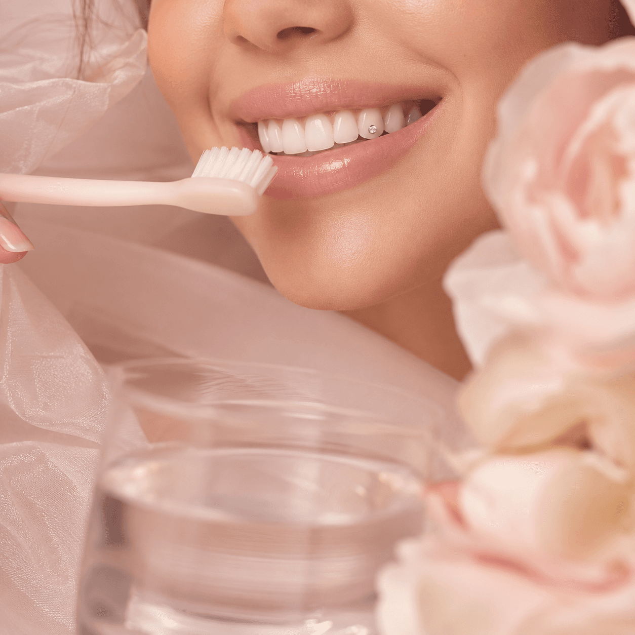 Soft smile detail with a delicate tooth gem